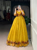 Women’s yellow Anarkali suit with embroidered bodice, printed skirt and traditional ethnic detailing
