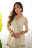 Graceful Ivory Embroidered Kurta Palazzo Set.