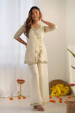 Graceful Ivory Embroidered Kurta Palazzo Set.