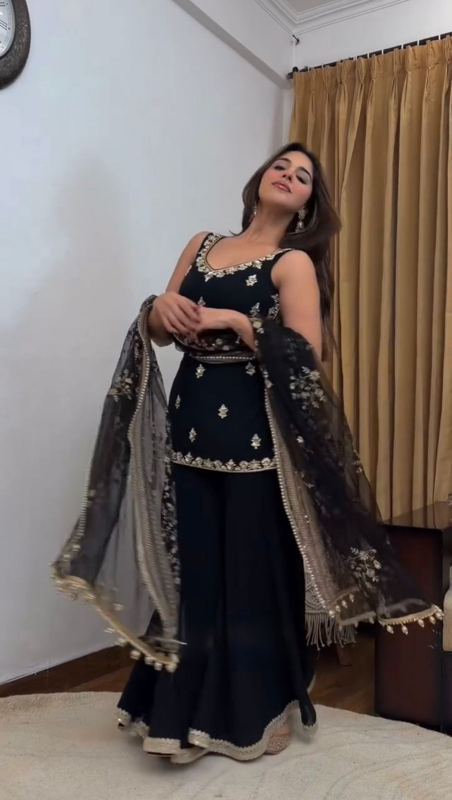 Elegant Black Embroidered Kurta Sharara Set with Dupatta.