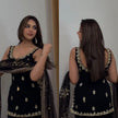 Elegant Black Embroidered Kurta Sharara Set with Dupatta.