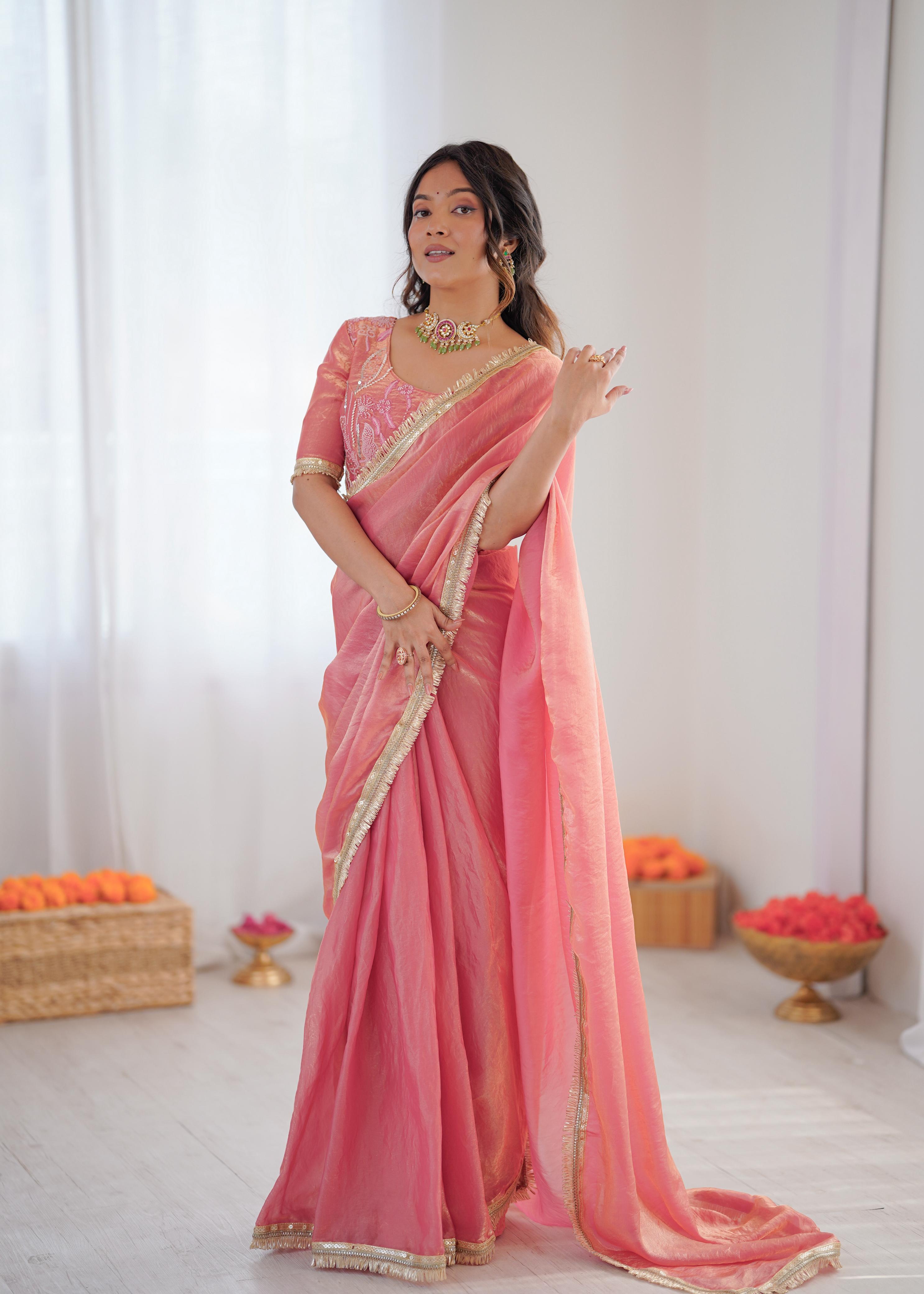 Elegant Peach Silk Saree with Golden Border.