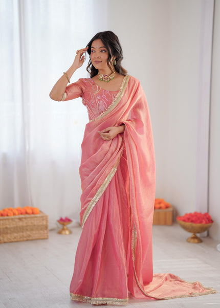 Elegant Peach Silk Saree with Golden Border.
