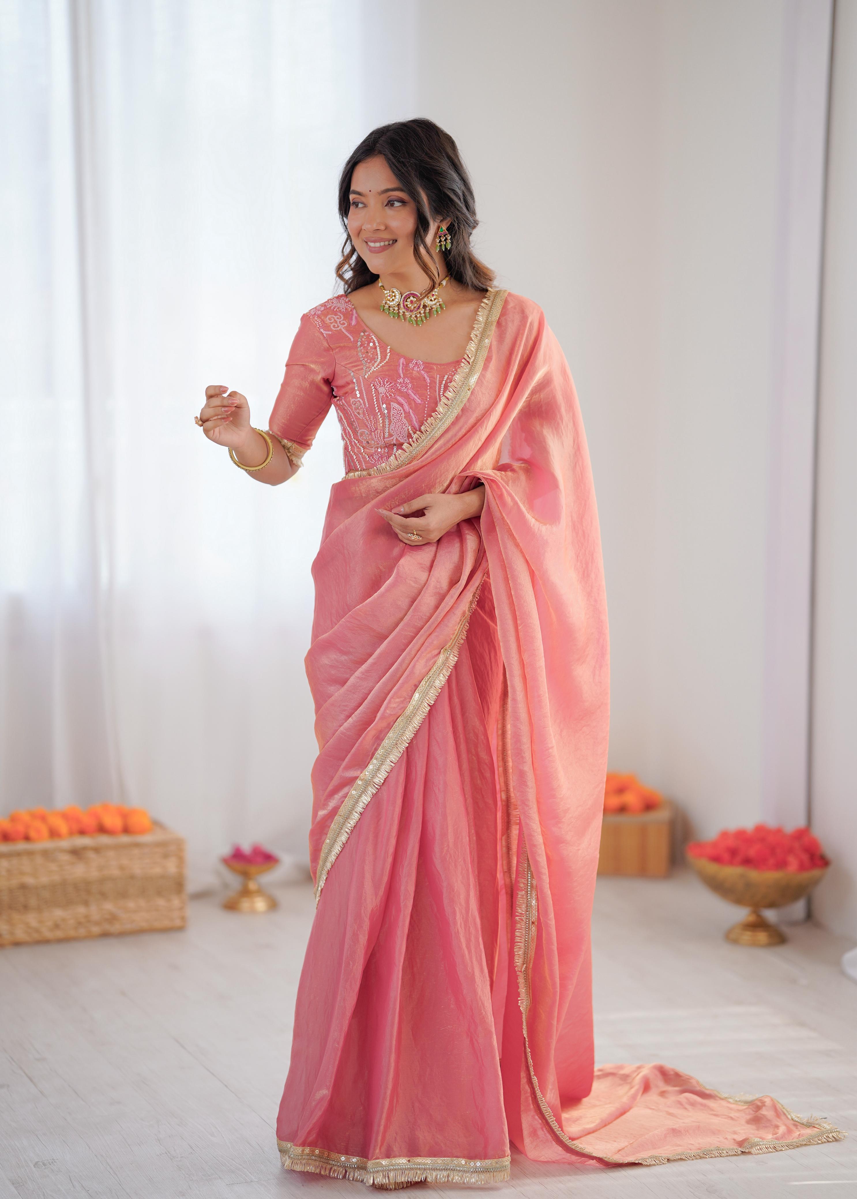 Elegant Peach Silk Saree with Golden Border.