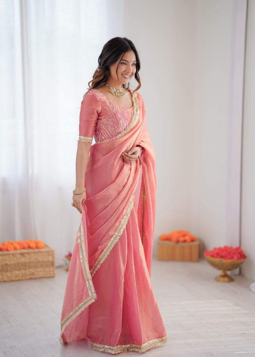 Elegant Peach Silk Saree with Golden Border.
