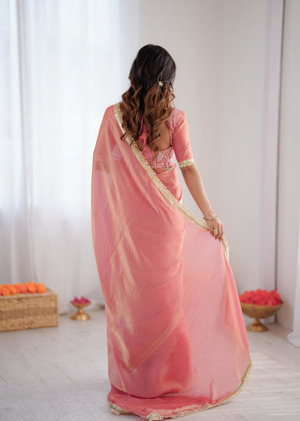 Elegant Peach Silk Saree with Golden Border.