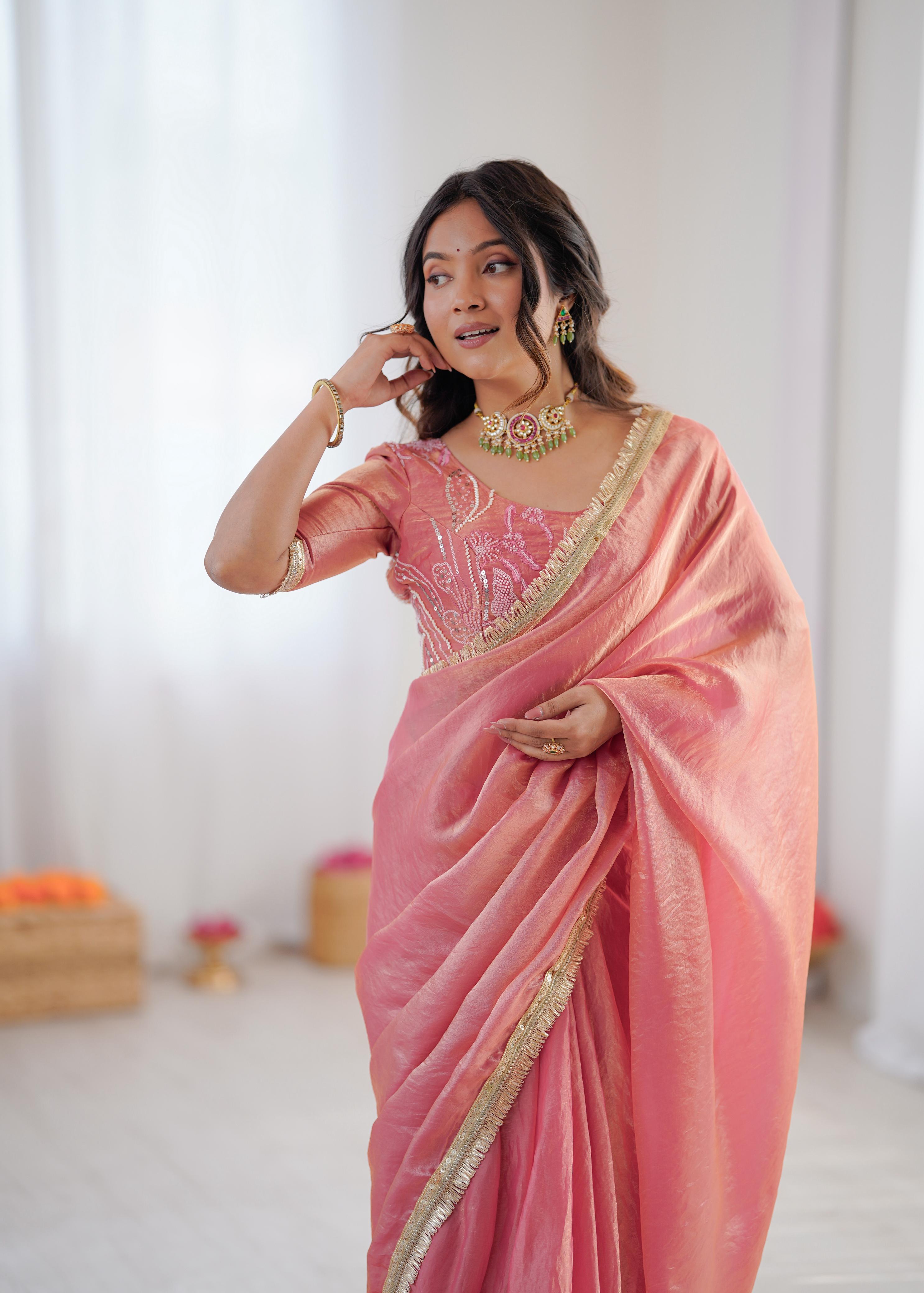 Elegant Peach Silk Saree with Golden Border.