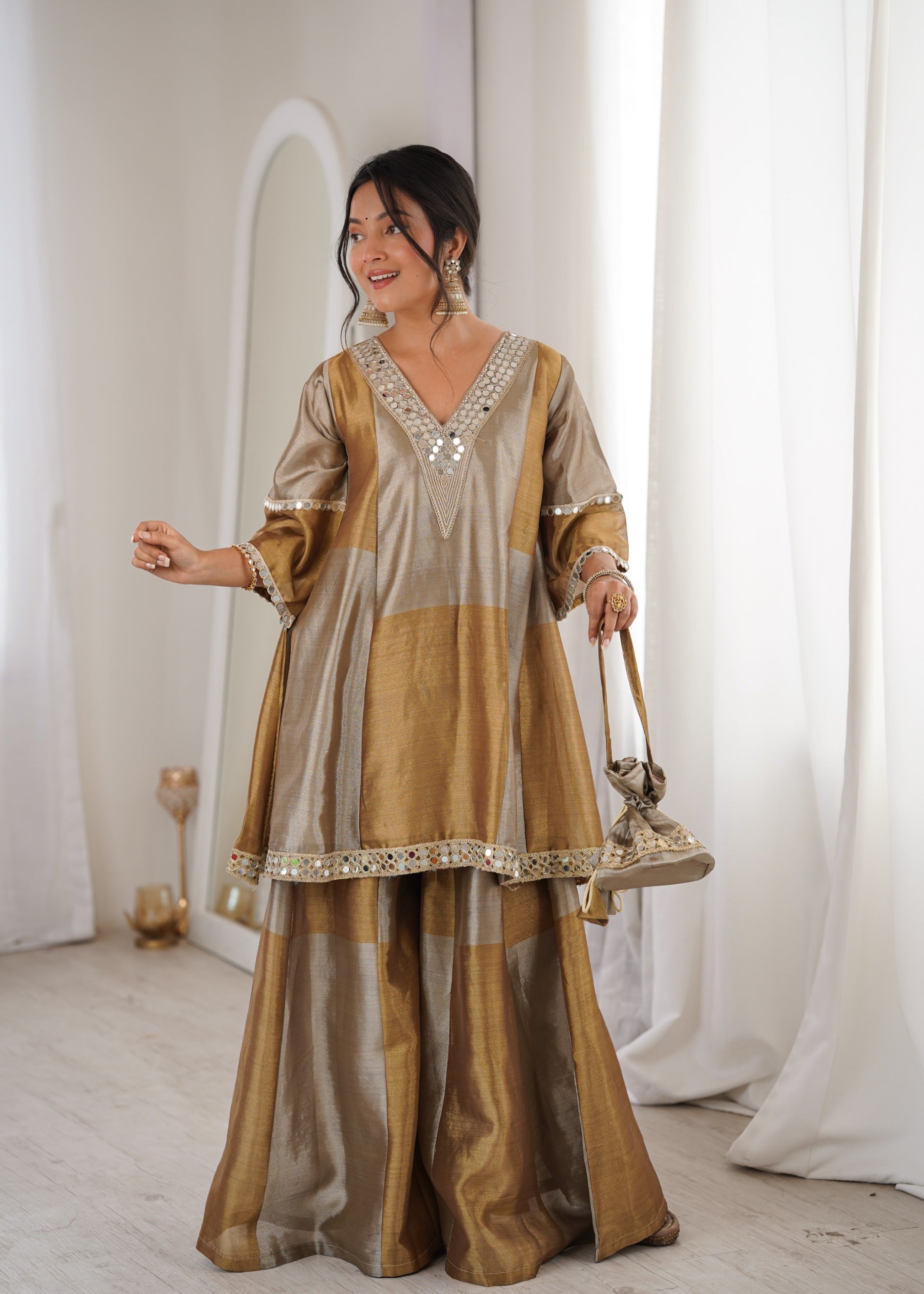 Women’s Gold Tone Festive Peplum Top with Flared Palazzo.