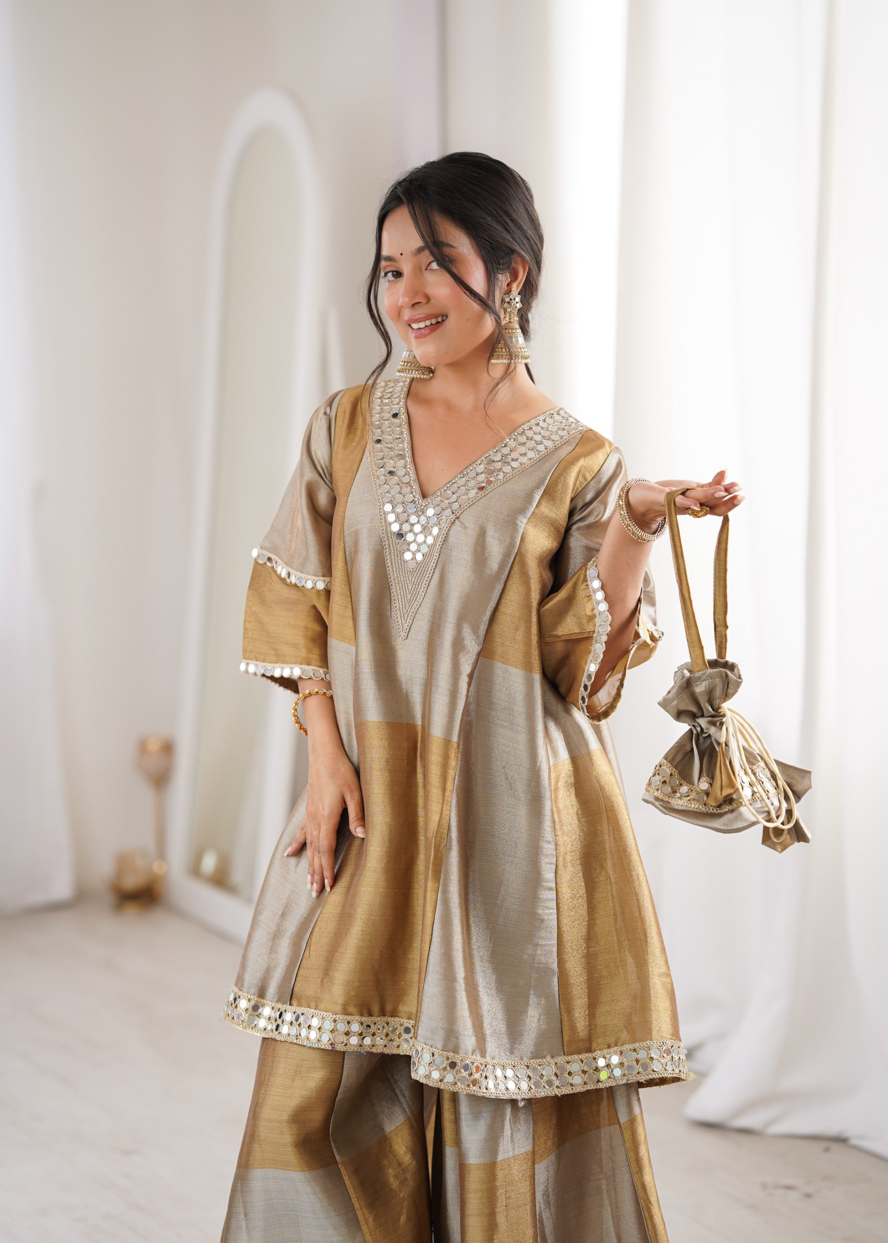Women’s Gold Tone Festive Peplum Top with Flared Palazzo.