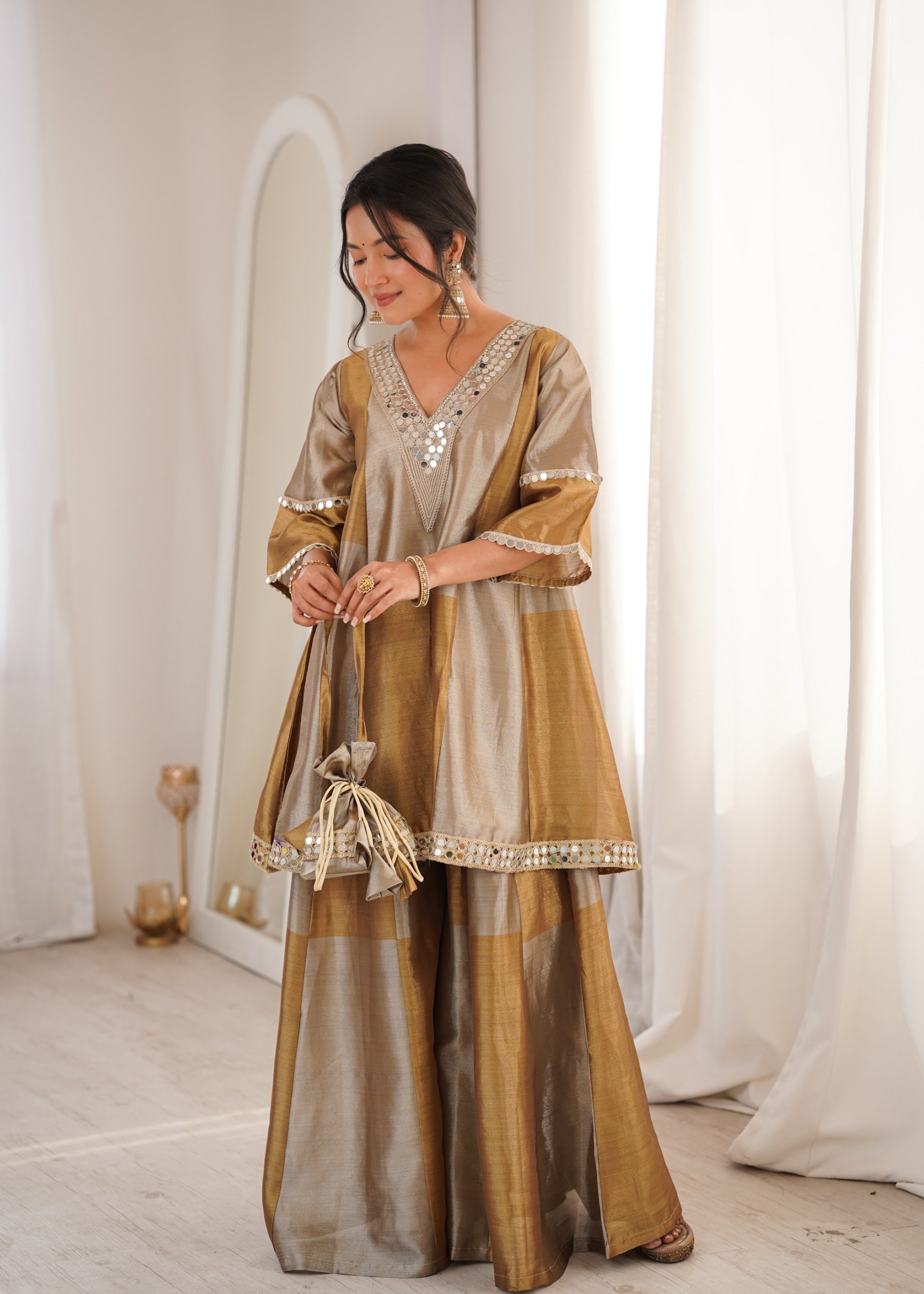 Women’s Gold Tone Festive Peplum Top with Flared Palazzo.