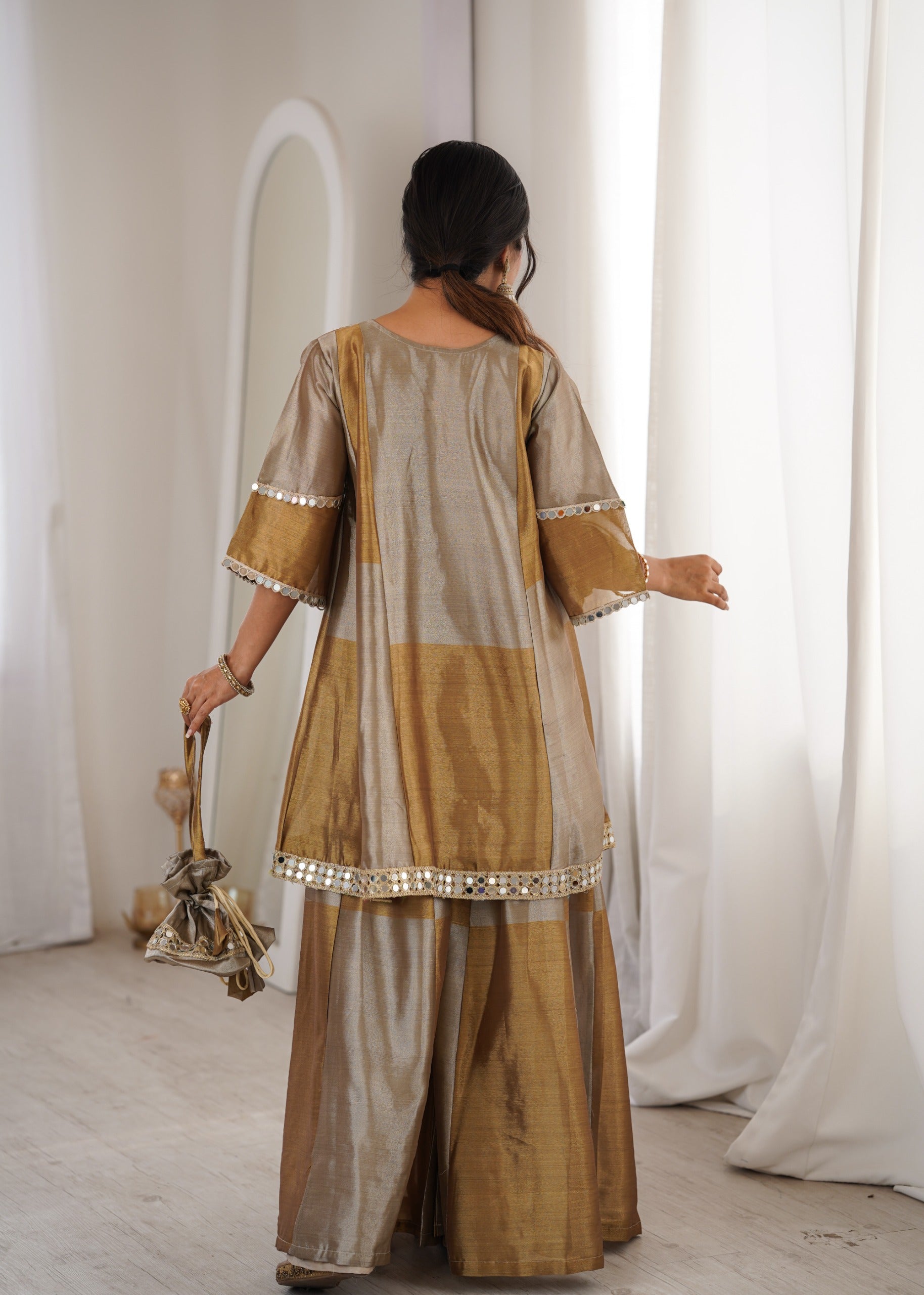 Women’s Gold Tone Festive Peplum Top with Flared Palazzo.