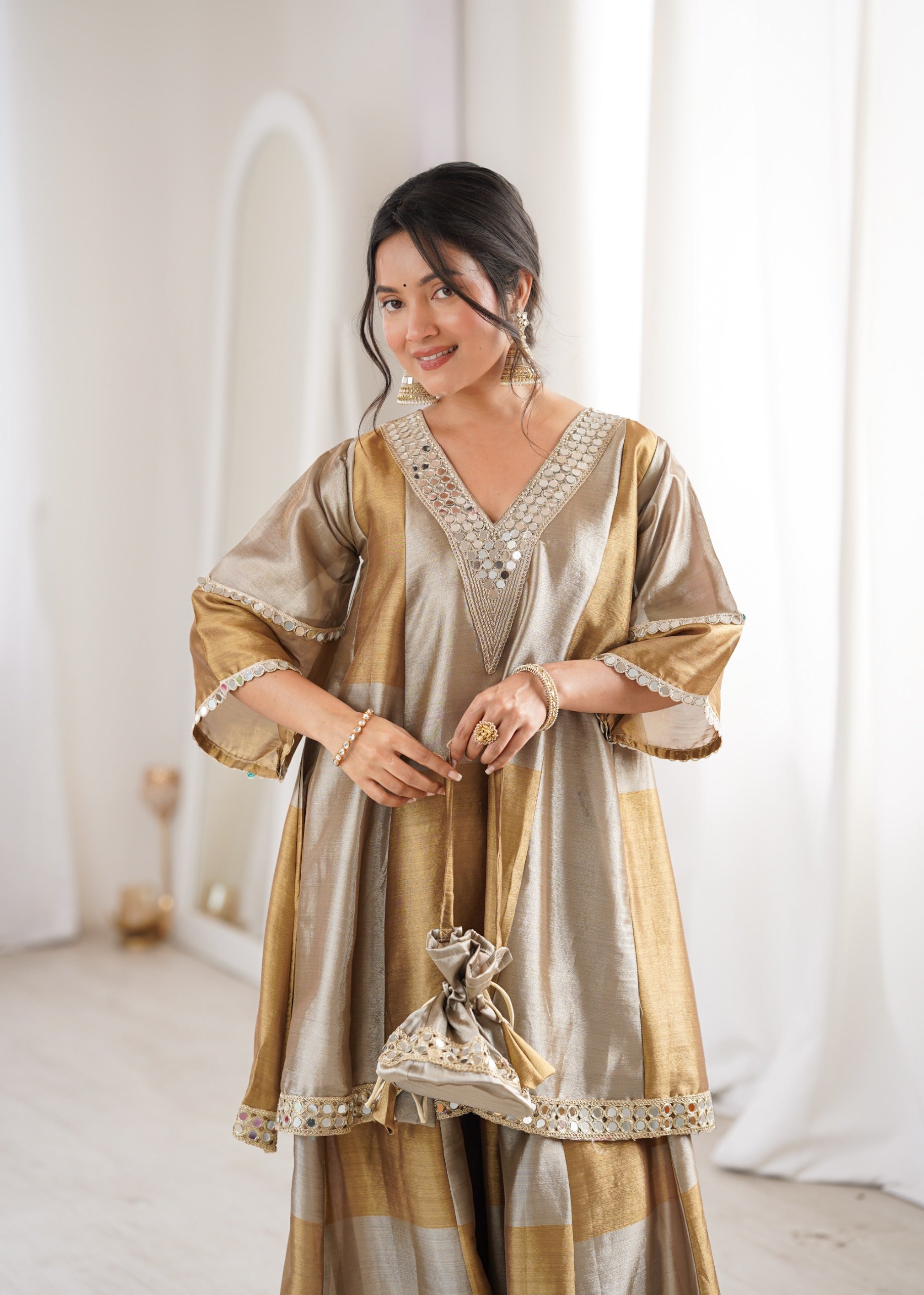 Women’s Gold Tone Festive Peplum Top with Flared Palazzo.