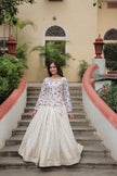 Floral Handwork Peplum Top with Flared Lehenga Skirt.