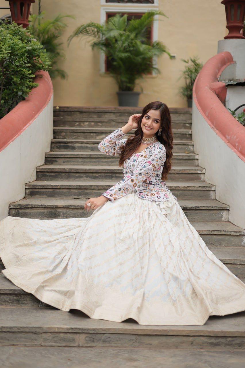 Floral Handwork Peplum Top with Flared Lehenga Skirt.
