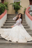 Floral Handwork Peplum Top with Flared Lehenga Skirt.
