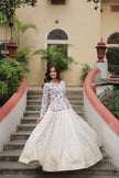 Floral Handwork Peplum Top with Flared Lehenga Skirt.