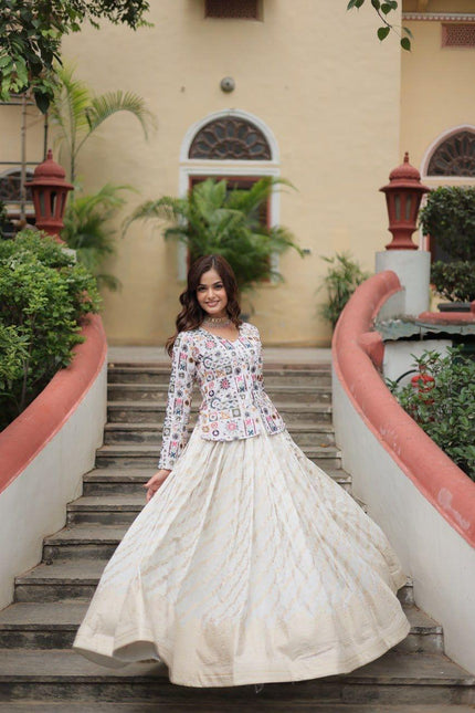 Floral Handwork Peplum Top with Flared Lehenga Skirt.