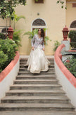 Floral Handwork Peplum Top with Flared Lehenga Skirt.