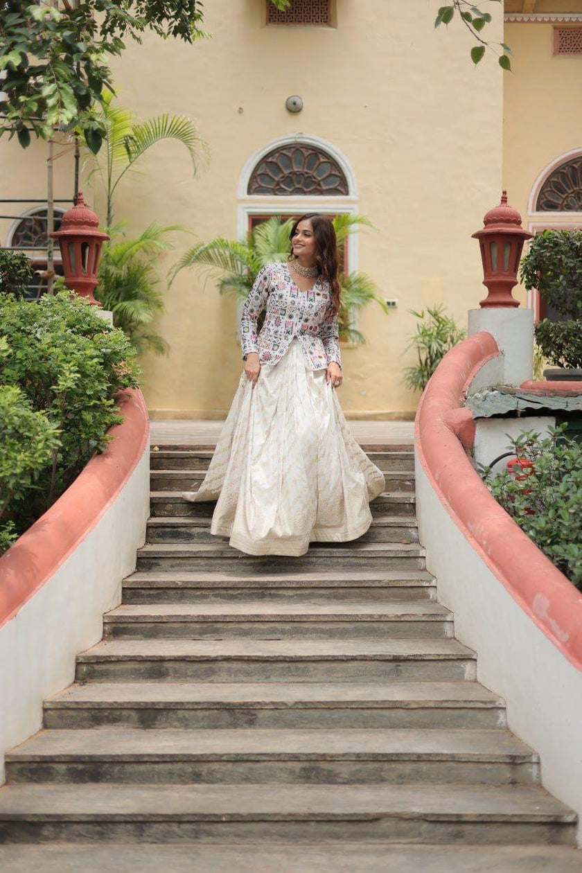 Floral Handwork Peplum Top with Flared Lehenga Skirt.