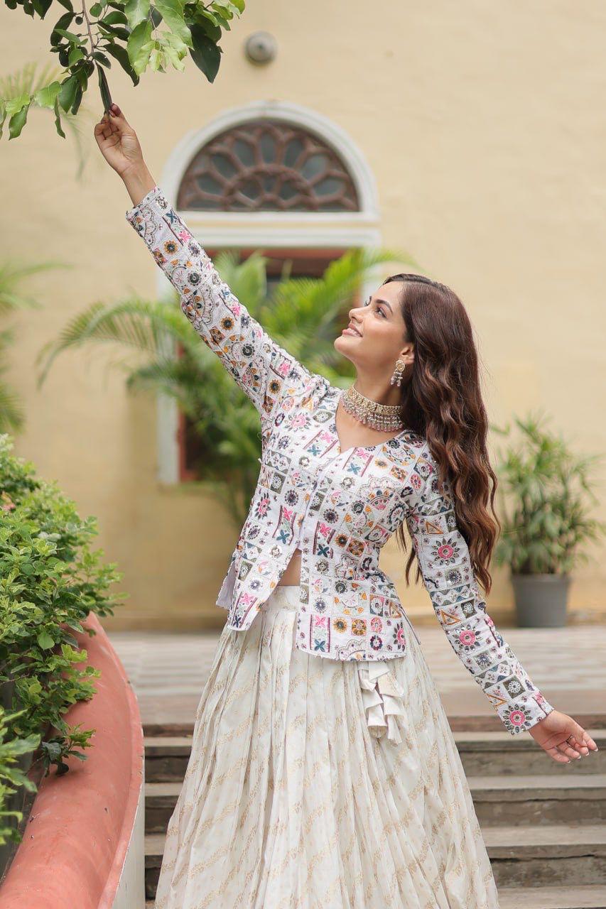 Floral Handwork Peplum Top with Flared Lehenga Skirt.