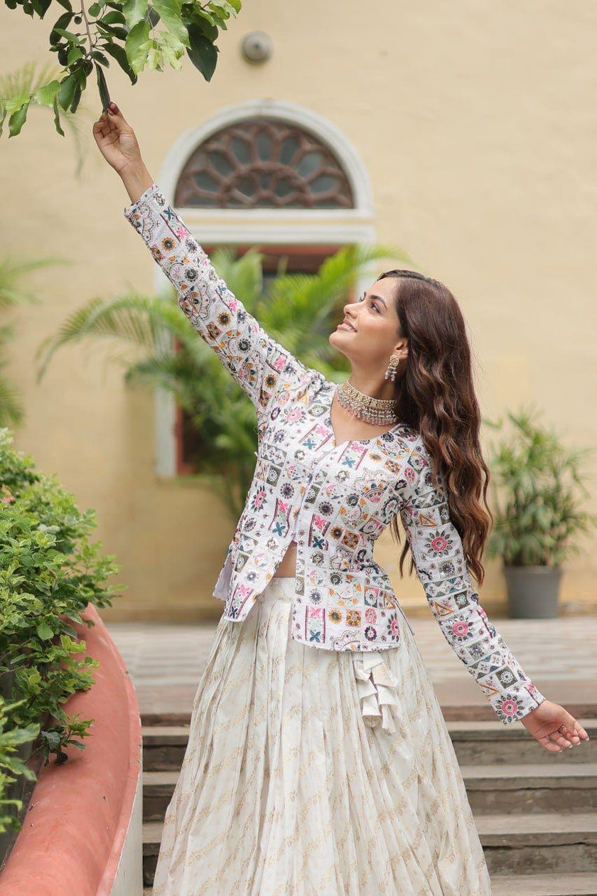 Floral Handwork Peplum Top with Flared Lehenga Skirt.