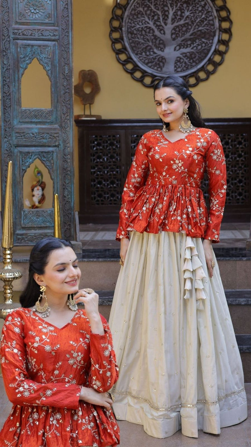 Women’s Festive Embroidered Top & Flared Lehenga Set.