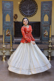 Women’s Festive Embroidered Top & Flared Lehenga Set.