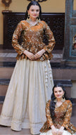 Women’s Festive Embroidered Top & Flared Lehenga Set.