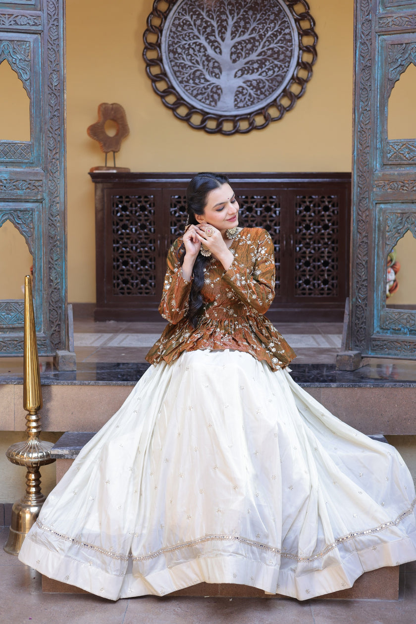Women’s Festive Embroidered Top & Flared Lehenga Set.
