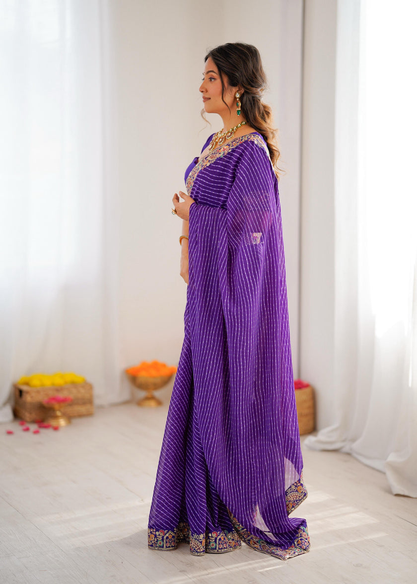Elegant Purple Leheriya Saree with Rich Embroidered Border.