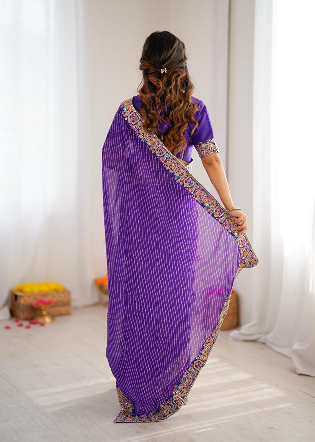 Elegant Purple Leheriya Saree with Rich Embroidered Border.