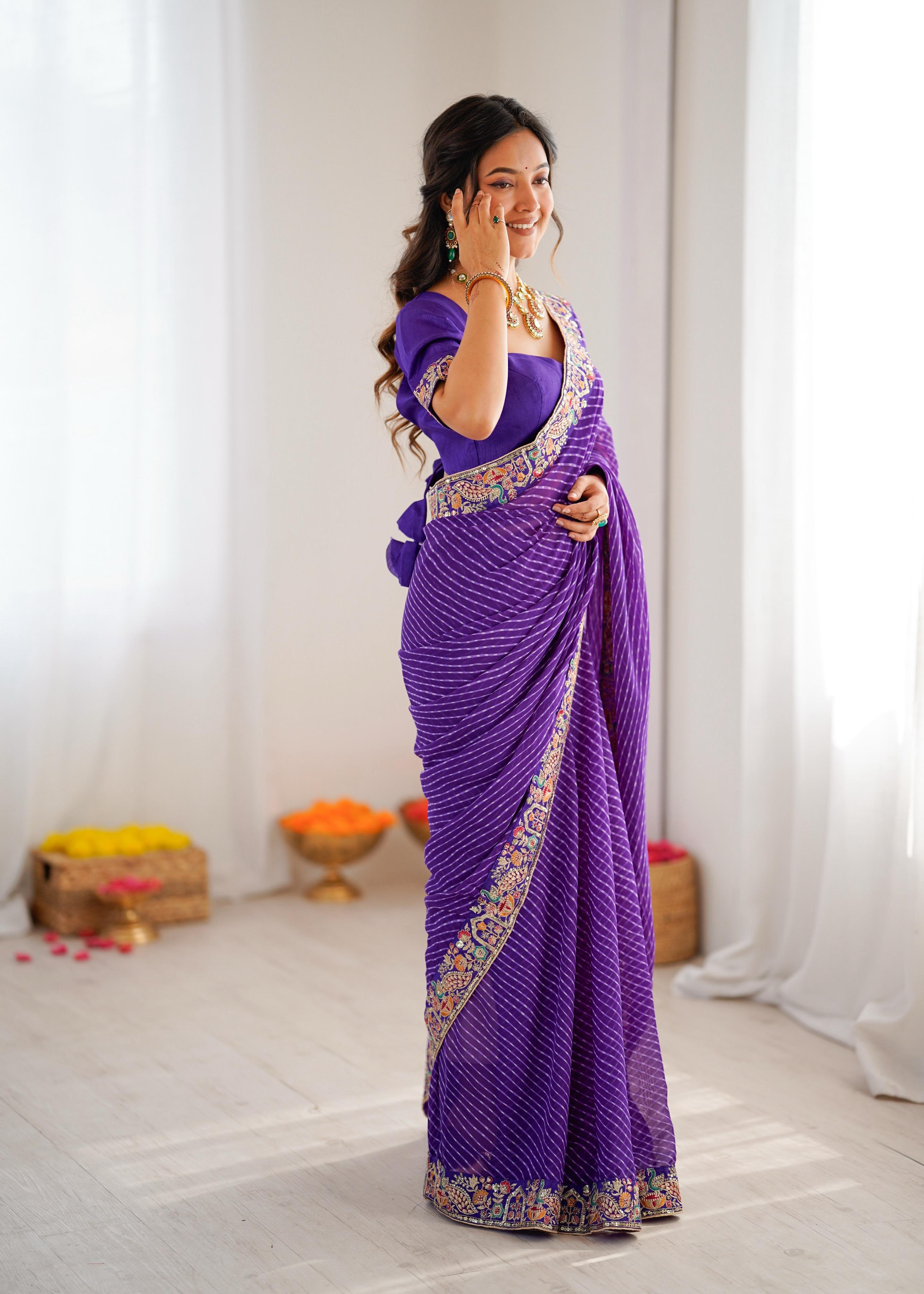 Elegant Purple Leheriya Saree with Rich Embroidered Border.