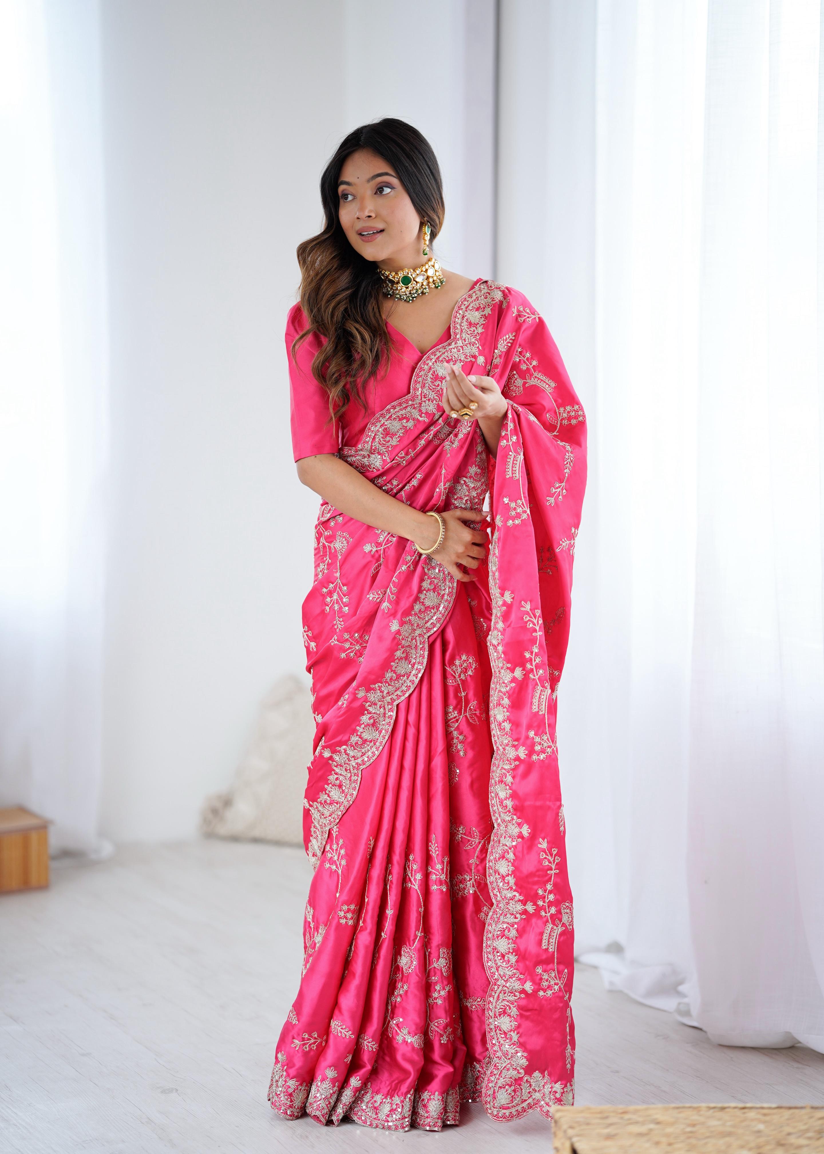 Rani Pink Embroidered Silk Saree with Elegant Zari Work.