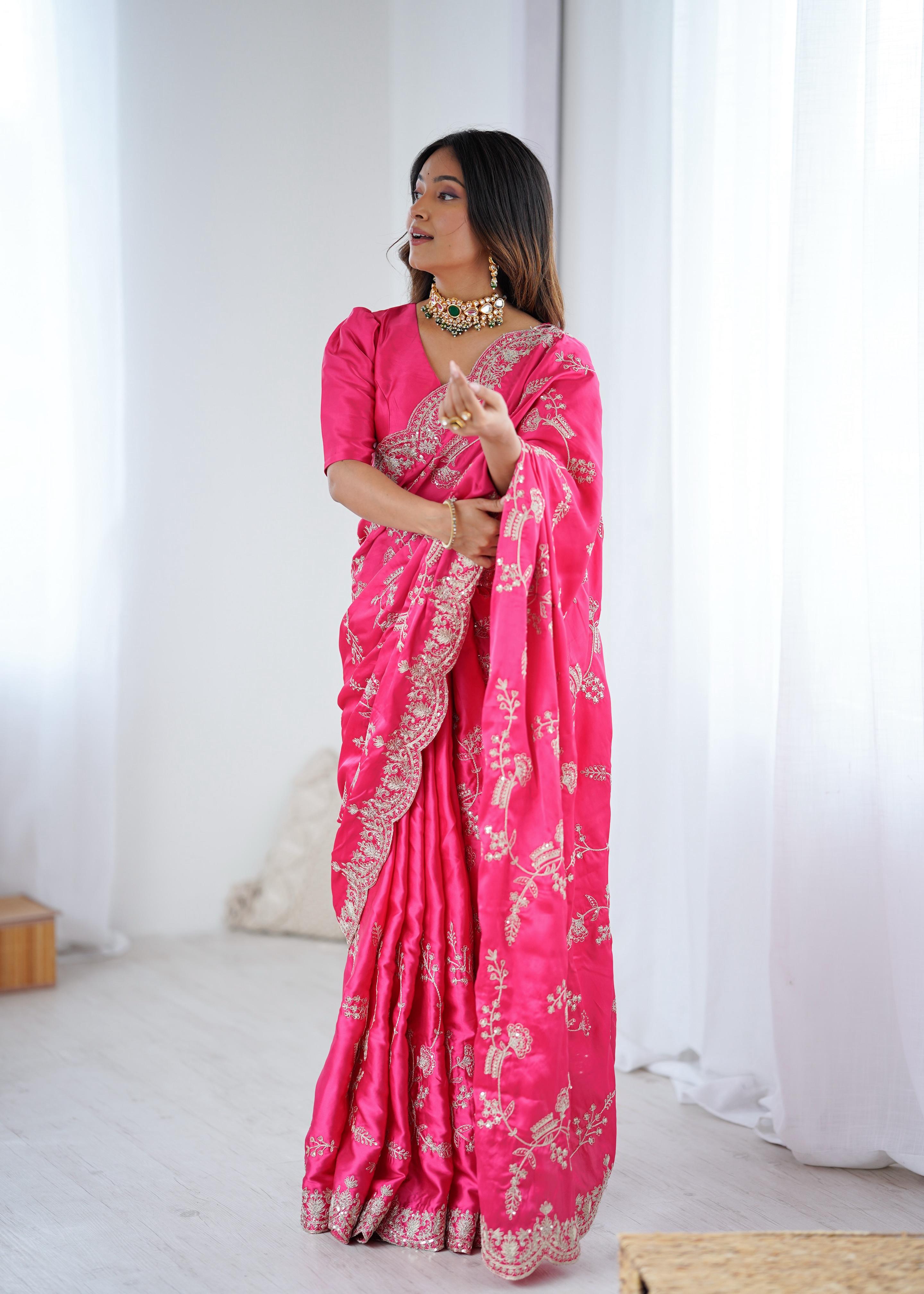 Rani Pink Embroidered Silk Saree with Elegant Zari Work.