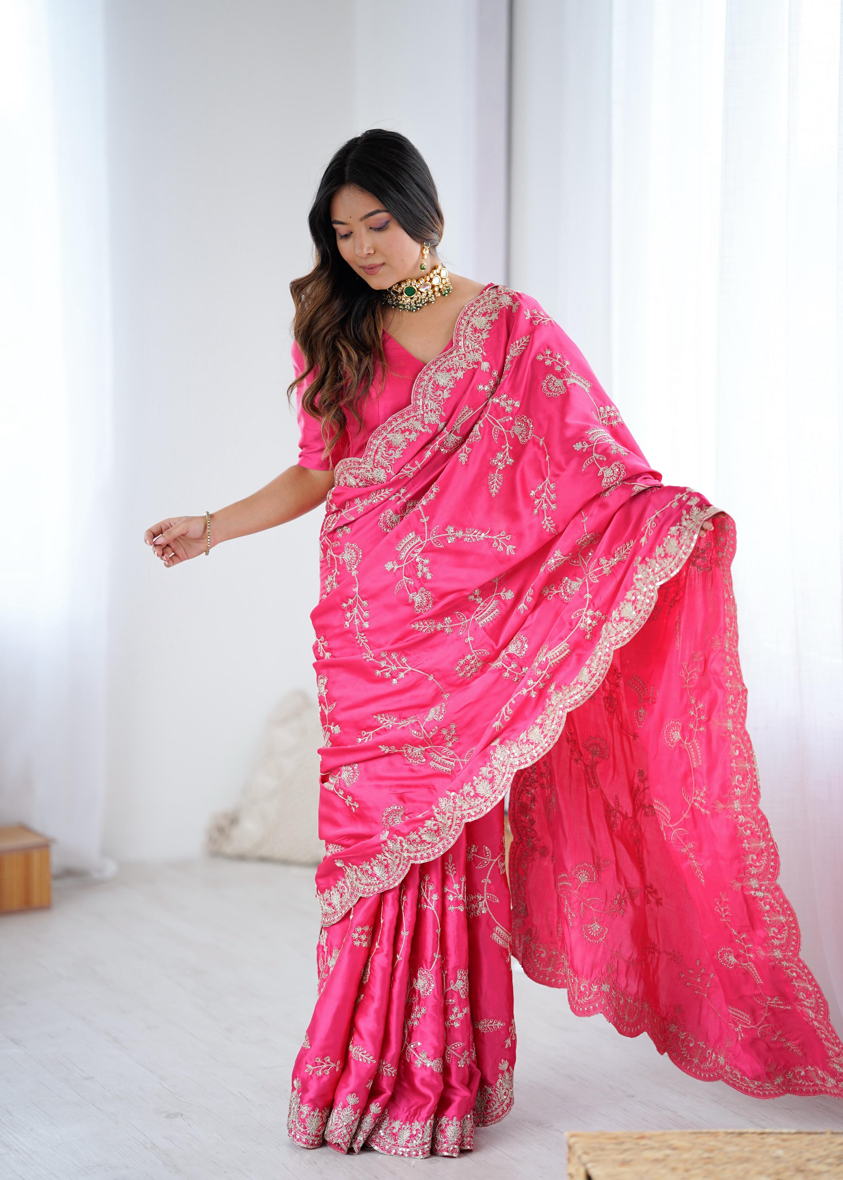 Rani Pink Embroidered Silk Saree with Elegant Zari Work.