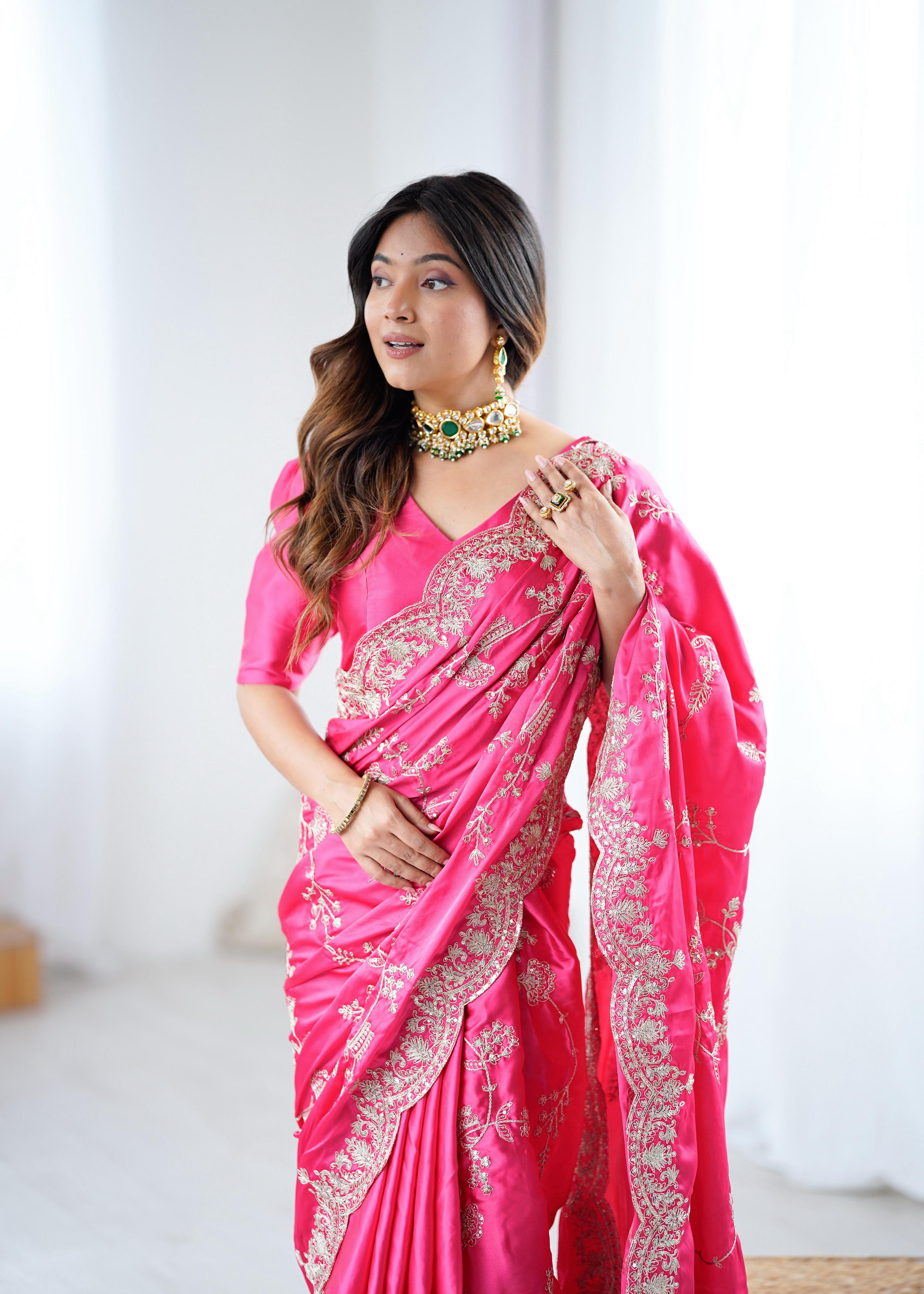 Rani Pink Embroidered Silk Saree with Elegant Zari Work.