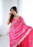 Rani Pink Embroidered Silk Saree with Elegant Zari Work.