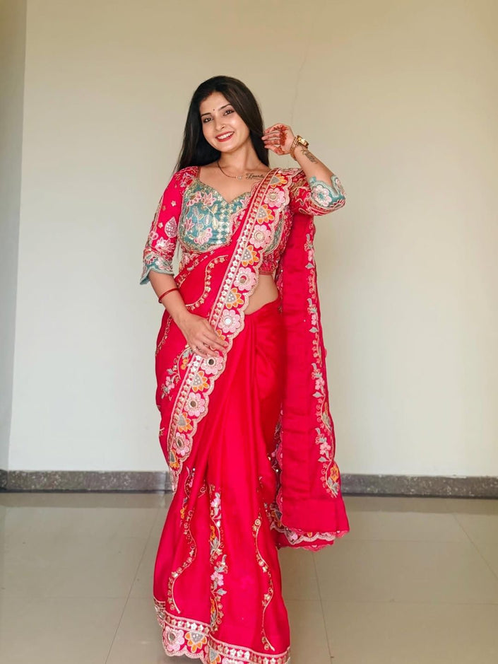 Stylish Pink Silk Saree with Heavy Border Work.