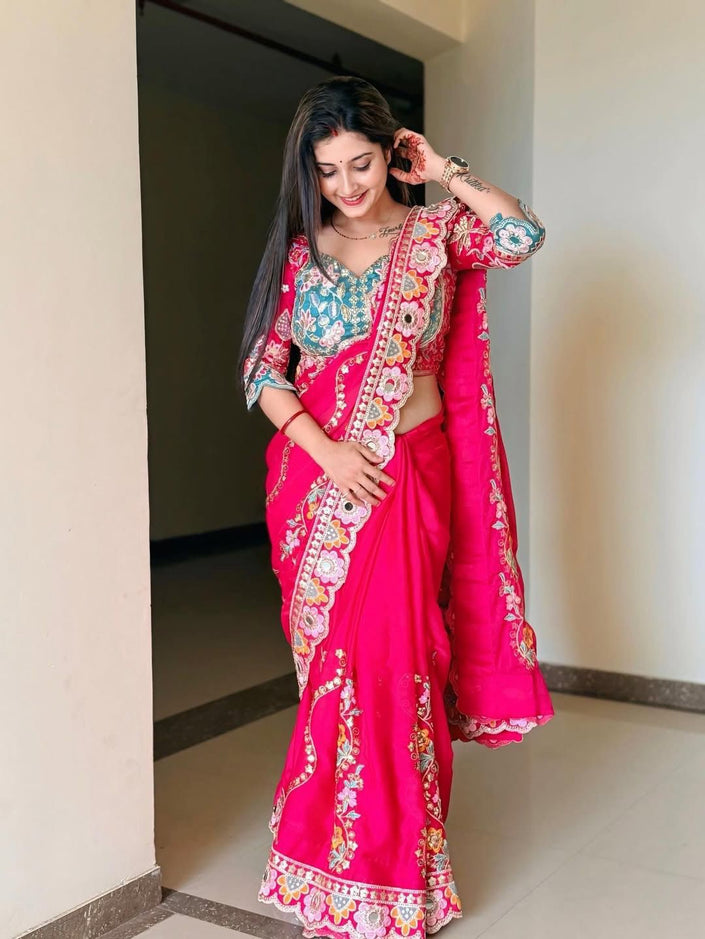 Stylish Pink Silk Saree with Heavy Border Work.