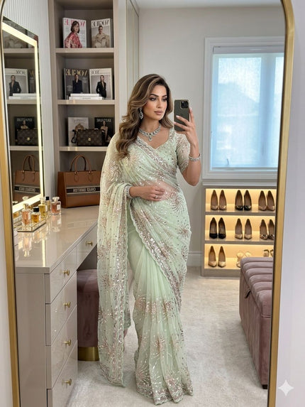 Party Wear Sequins Embroidered Net Saree.