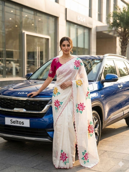 Elegant White Floral Embroidered Saree with Pink Blouse.