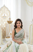 Graceful Festive Wear Organza Saree with Rich Silver Zari Weaving and Contrast Blouse.