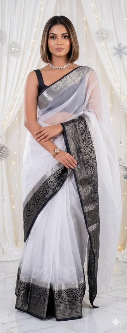 Graceful Festive Wear Organza Saree with Rich Silver Zari Weaving and Contrast Blouse.