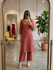 Stylish Embroidered Straight Kurta with Palazzo Pants.
