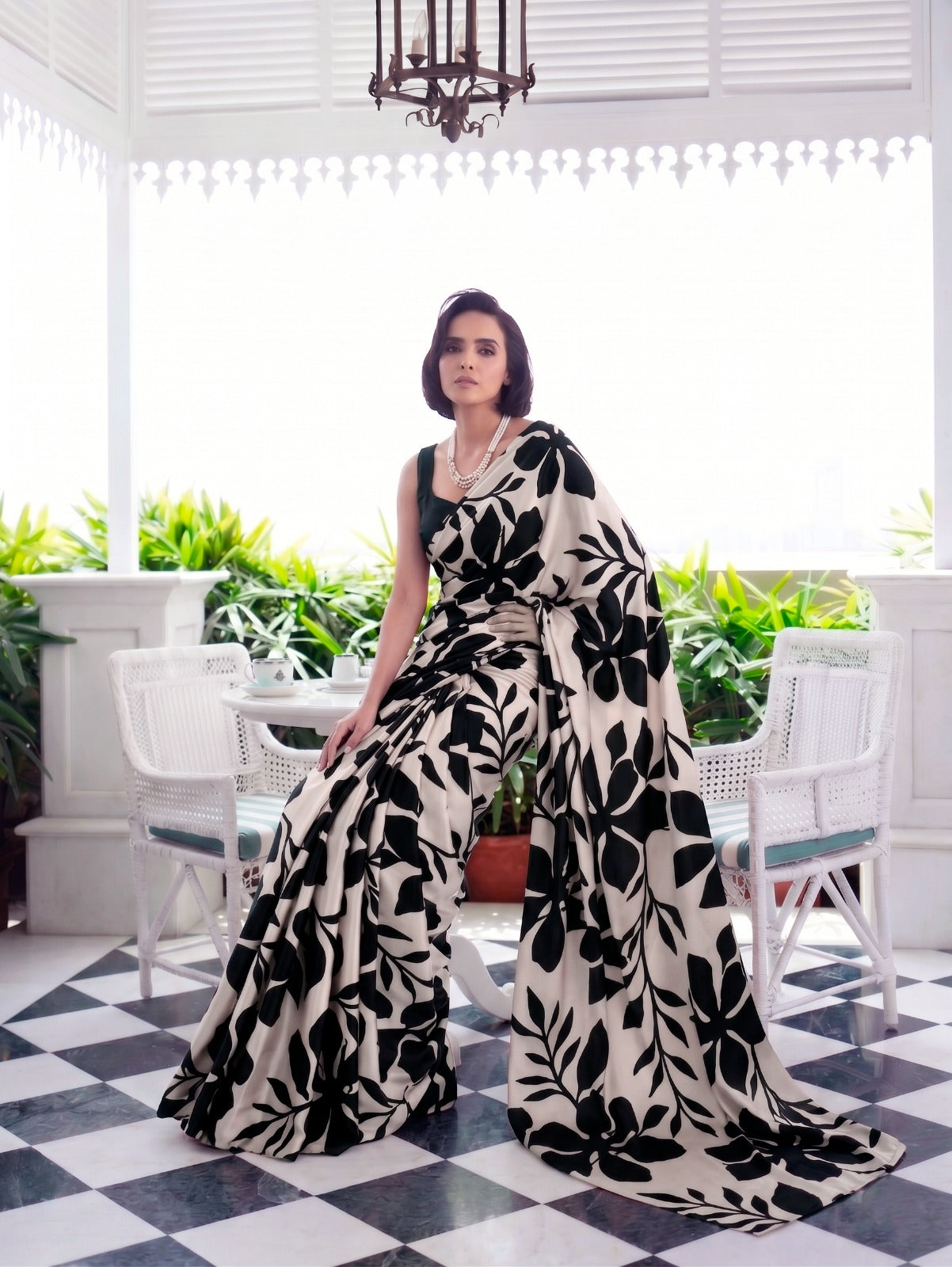 Designer Saree for Women with Artistic Floral Print and Graceful Drape .