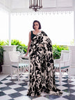 Designer Saree for Women with Artistic Floral Print and Graceful Drape .
