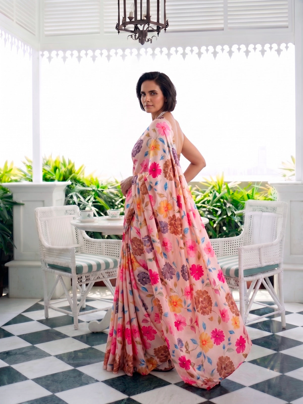 Designer Saree for Women with Artistic Floral Print and Graceful Drape .