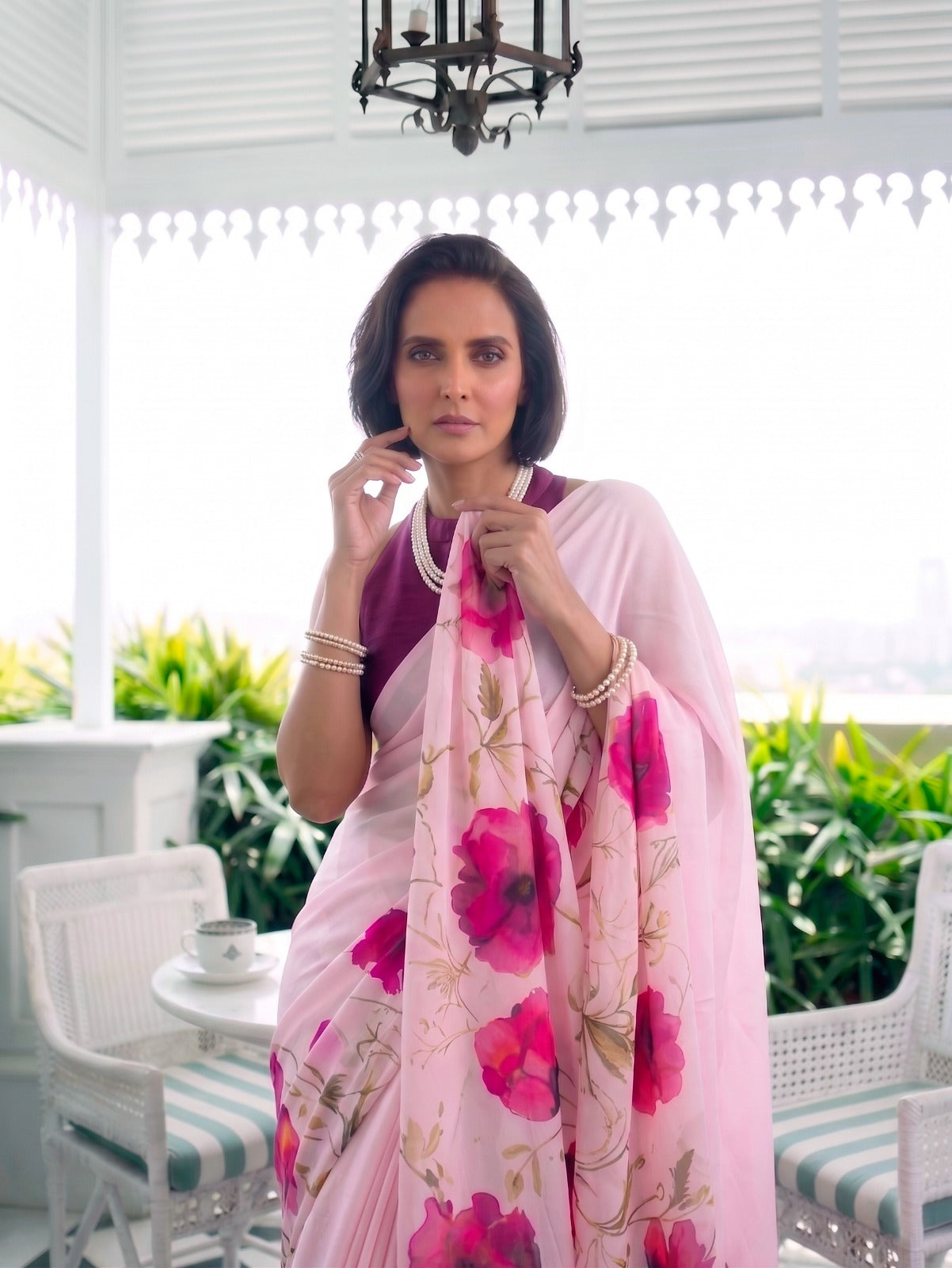 Designer Saree for Women with Artistic Floral Print and Graceful Drape .